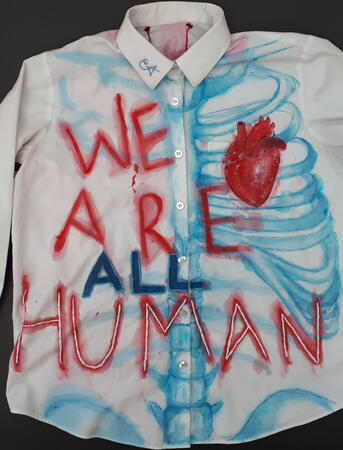 "𝗪𝗲 𝗮𝗿𝗲 𝗮𝗹𝗹 𝗛𝗨𝗠𝗔𝗡"(front)-Hand-sewn and painted T-shirt.Created around the topic of social issues and doing something about it